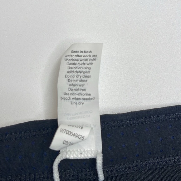 Athleta Black Bikini Bottom with Laser Cut detailing on Hips Size Large - Picture 6 of 11